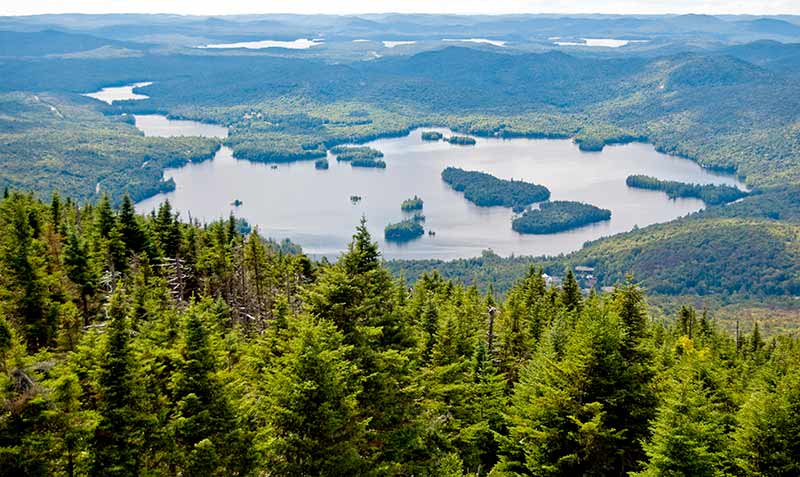 View of Blue Mountain Lake from the summit of Blue Mountain by Flickr user Nekenasoa