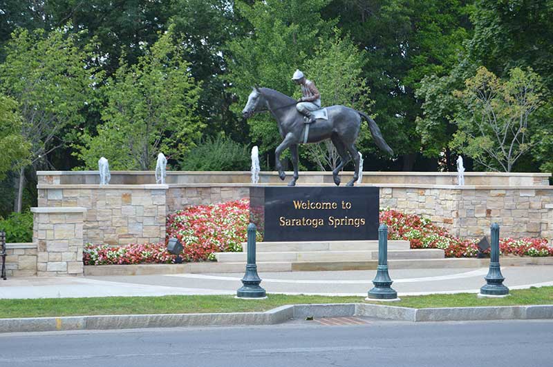 Welcome to Saratoga Springs sign & statue on Union avenue as you enter Downtown Saratoga