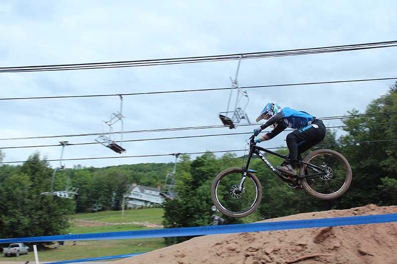 Mountain biker racing on Windham Mountain