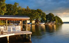 docks and homes on the shore of one of new york's finger lakes