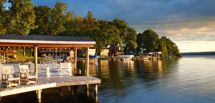 docks and homes on the shore of one of new york's finger lakes