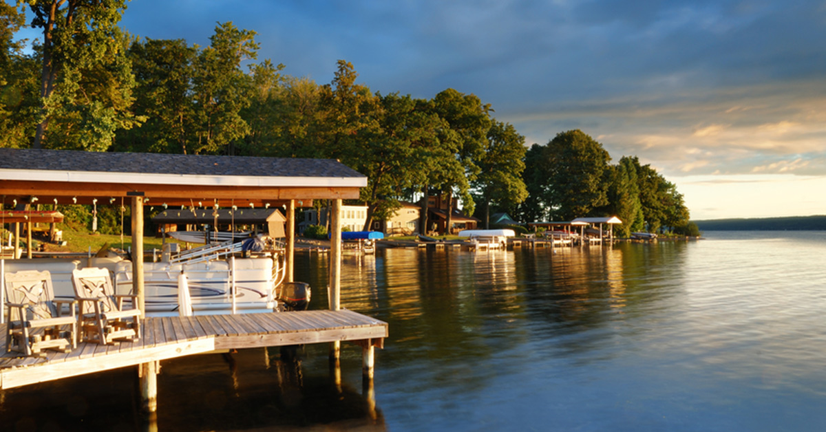 docks and homes on the shore of one of new york's finger lakes