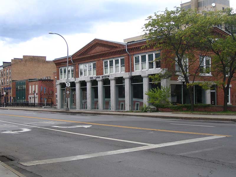 Erie Canal Museum in Syracuse as seen from the street that now covers the former canalway