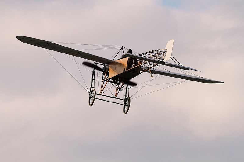 An early propeller plane in flight