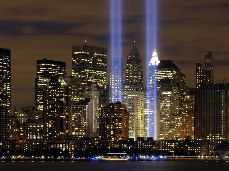 NYC Skyline at night with World Trade Center memorial lights