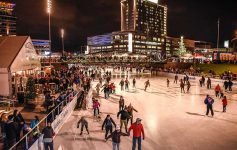 People ice skating at Canalside in downtown Buffalo