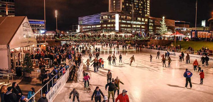 People ice skating at Canalside in downtown Buffalo