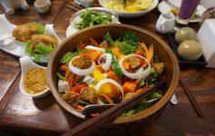 Bowl of vegan stir fry with tempeh