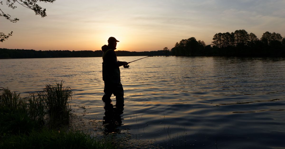 man fishing on a shore